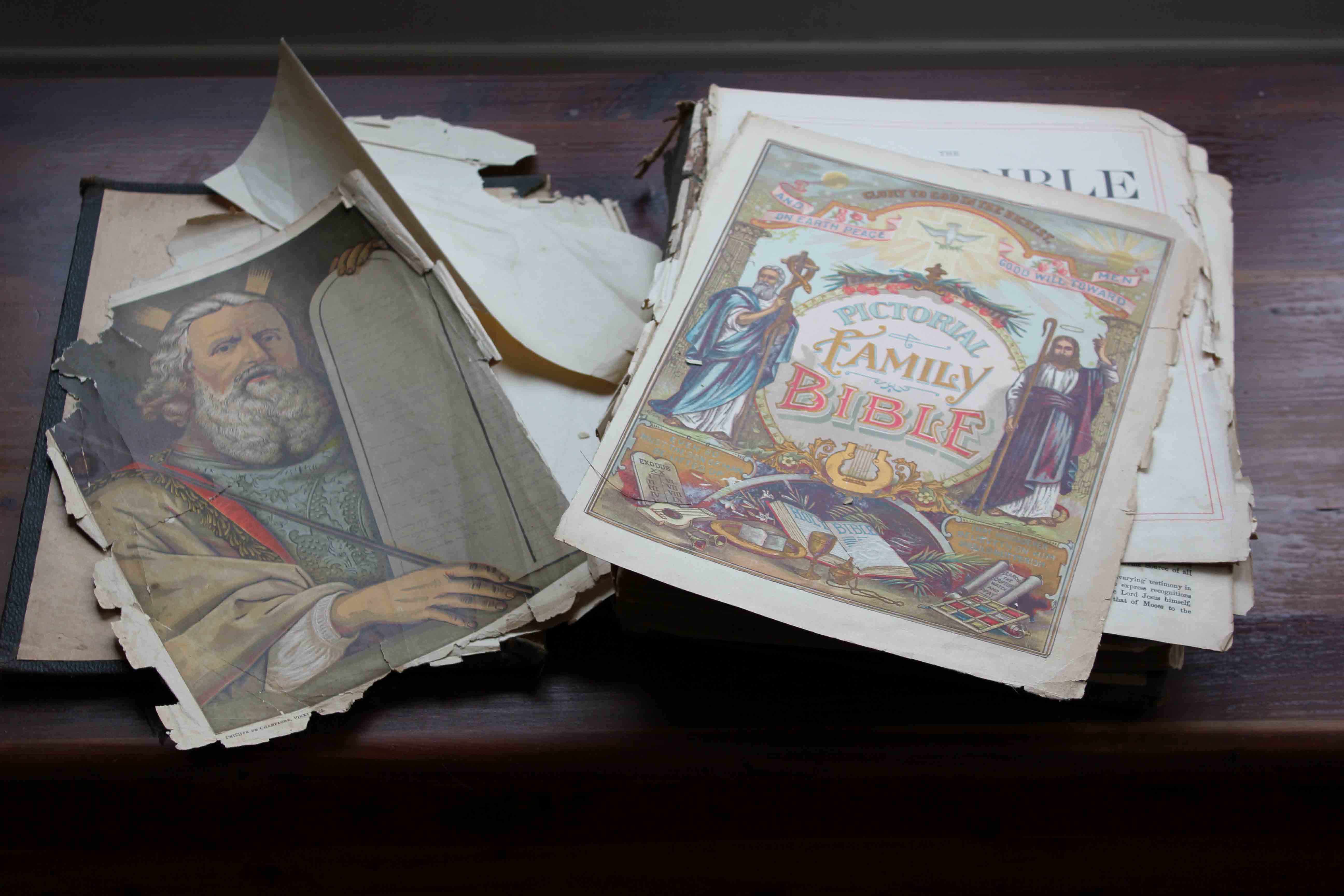 inside of cloth bible with loose shredded pages