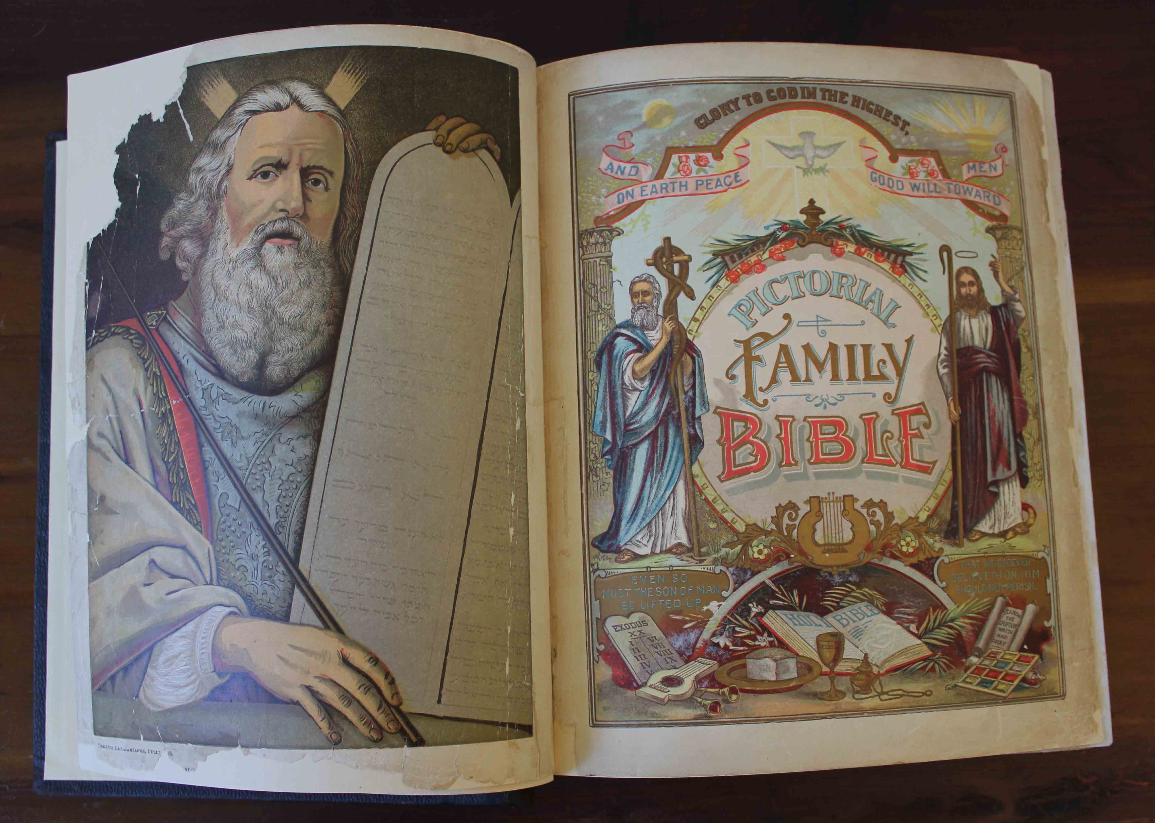 inside of book with mended pages and folios attached