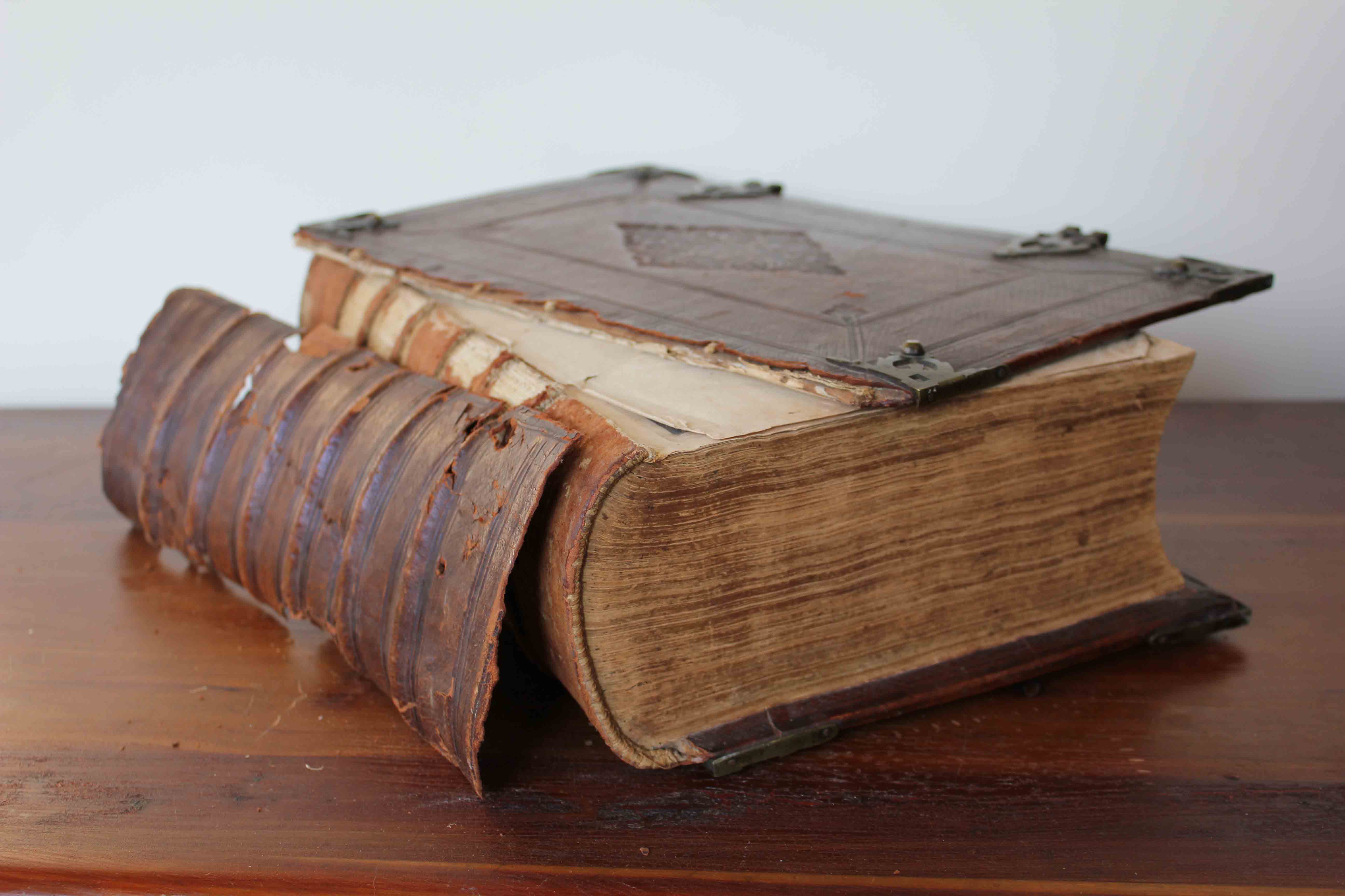 old family bible with cover and spine off
